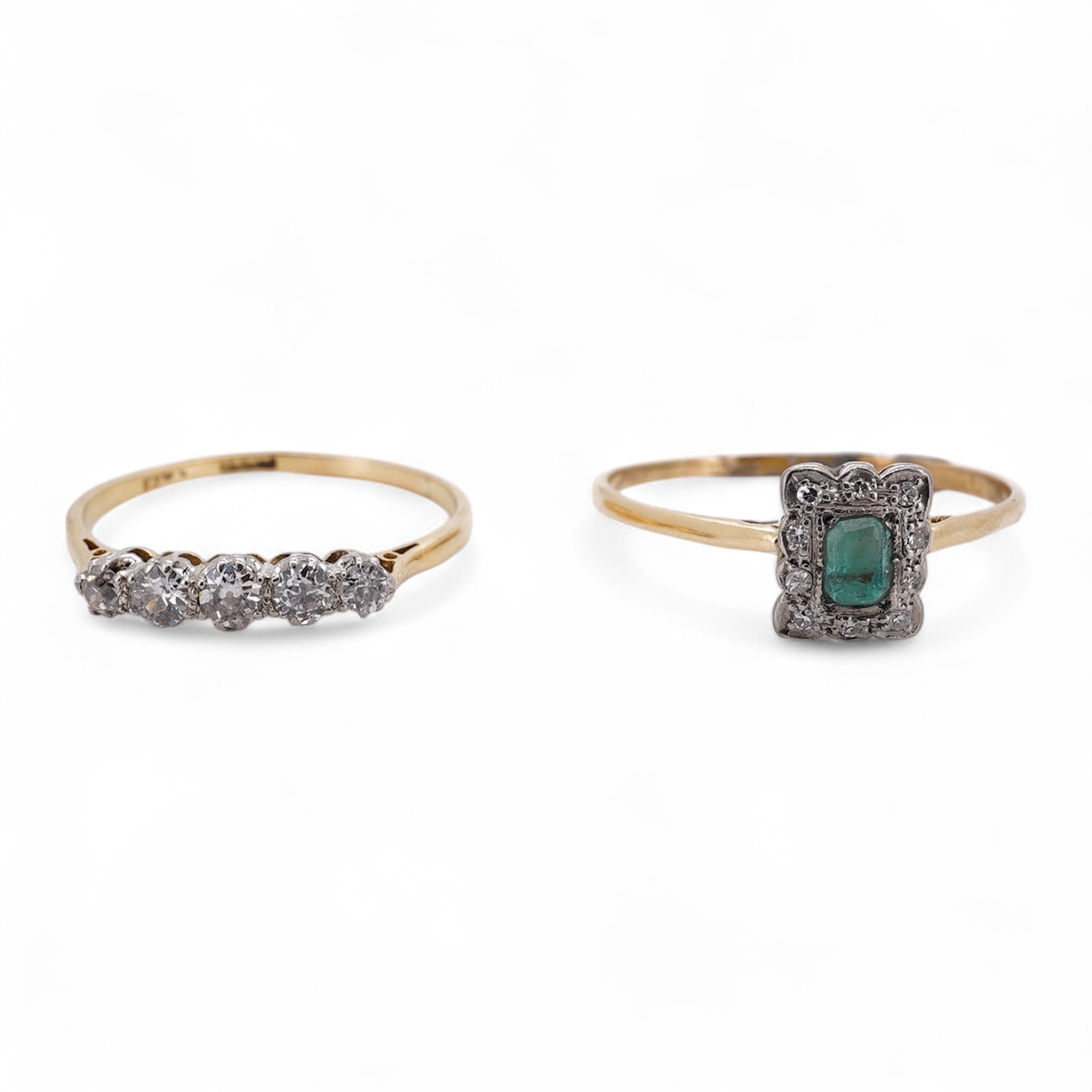 An 18ct and plat. five stone diamond set half hoop ring, size V together with a yellow metal emerald and diamond set tablet ring, size Z+++, gross weight 4.5 grams. Condition - fair